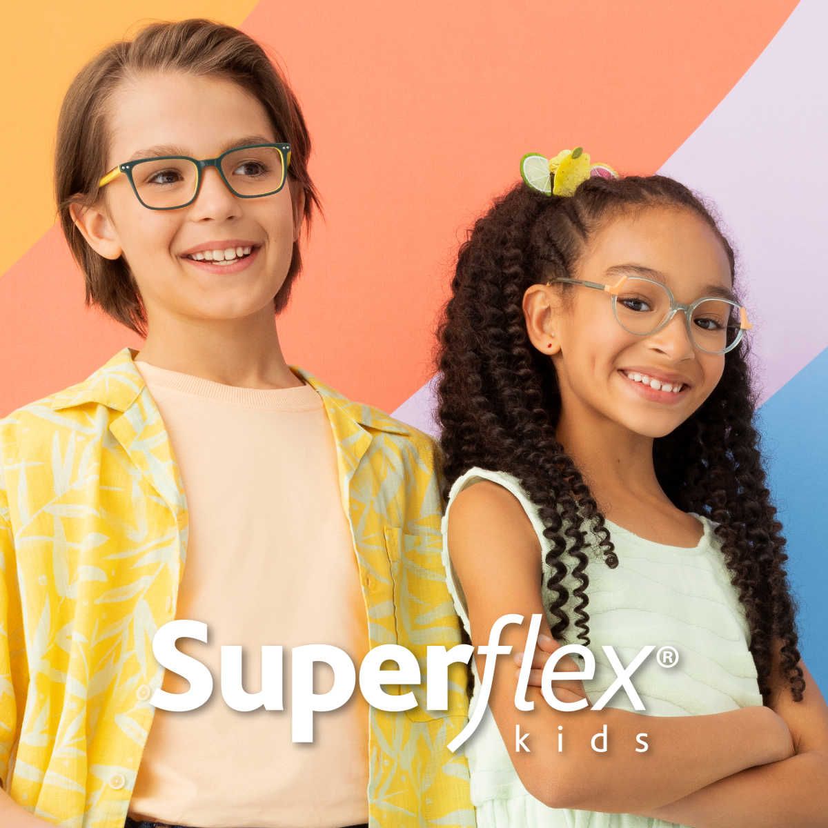 Two young smiling children showing off two different types of Superflex kids frames